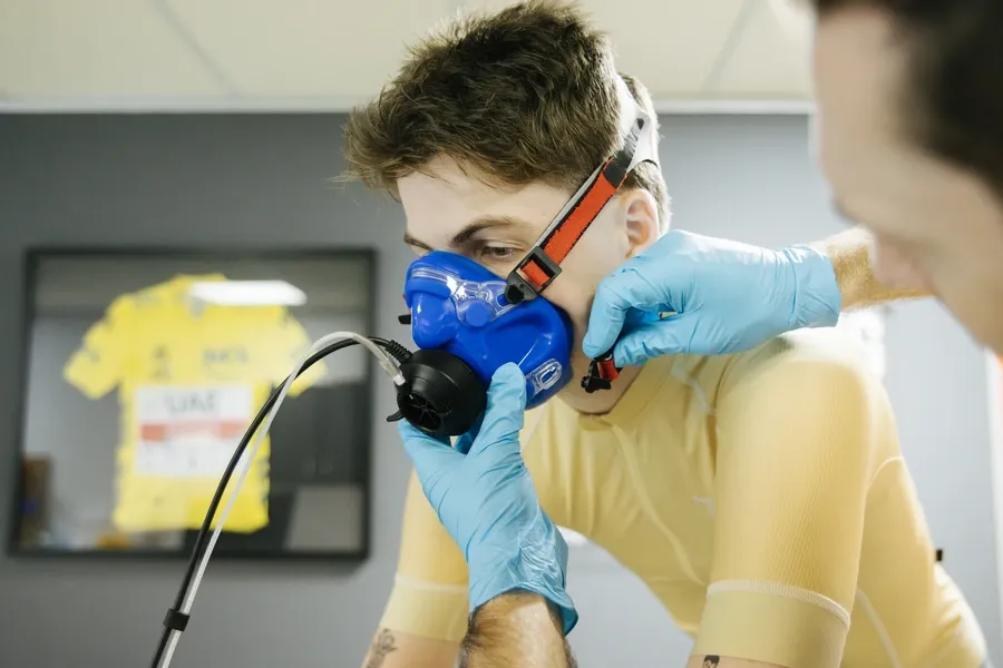 Cyclist during a VO₂ Max ramp test with Cosmed metabolic cart